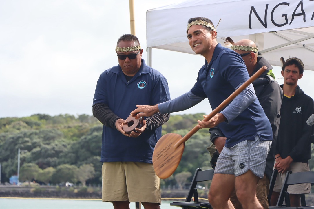 Keoni voyaging on a traditional sailing canoe